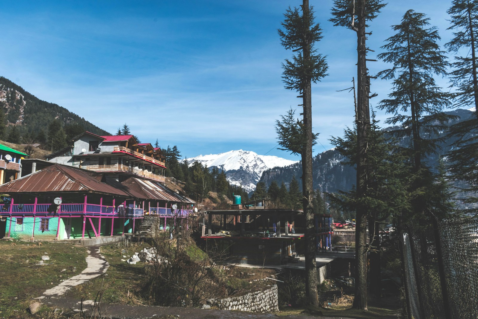 a village with a mountain in the background