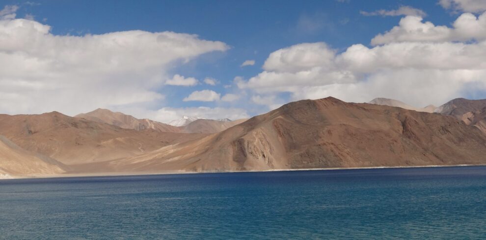 a large body of water surrounded by mountains