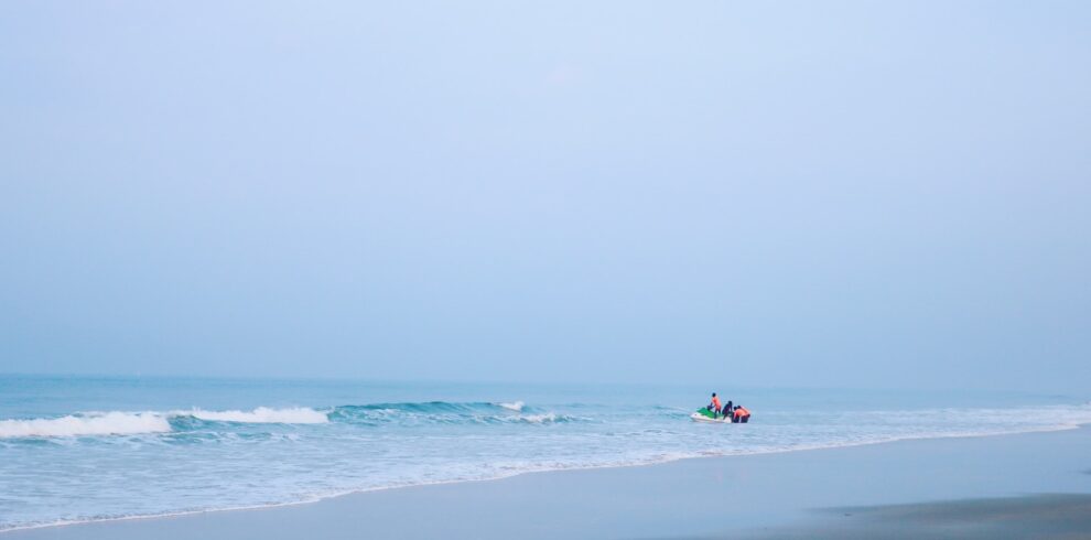 person surfing on sea during daytime