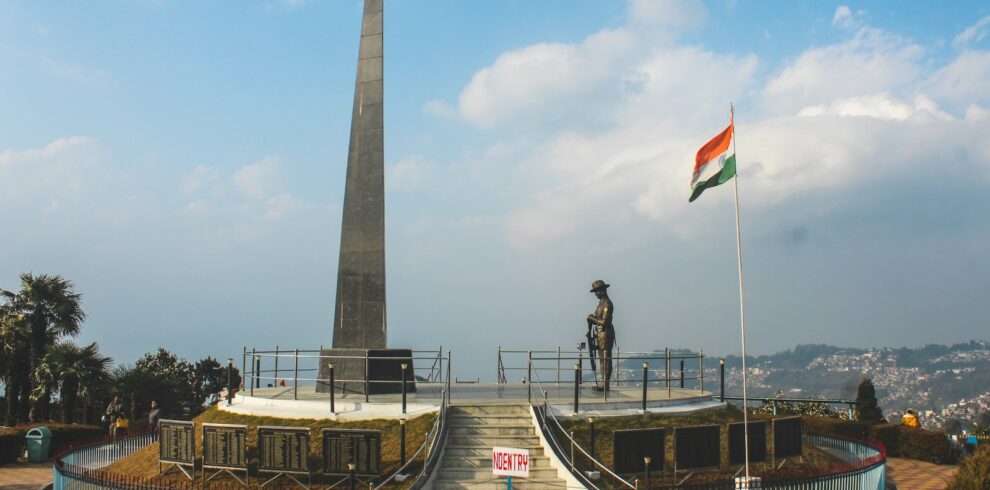 a monument with a flag on top of it