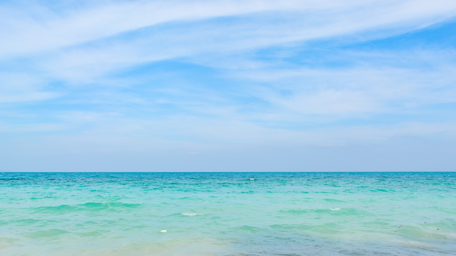 a view of the ocean from the beach